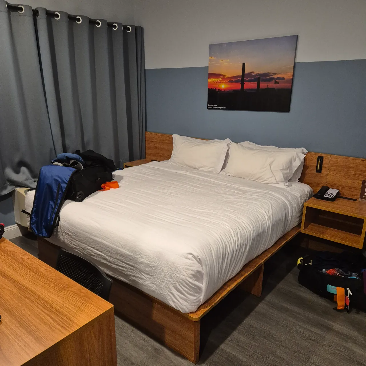 Hotel room showing the bed taking up almost all of the space.